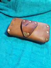 Pouch with engraved wolves