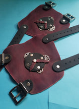 Pair of gear and clock bracers