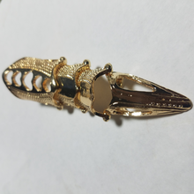finger armor ring gold