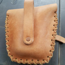 back of leather pouch with lacing 