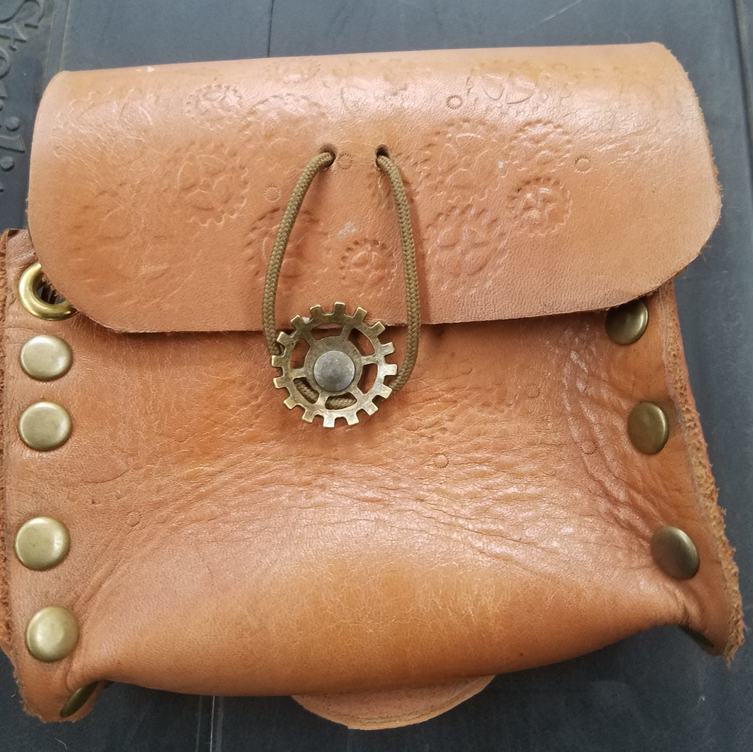 Leather pouch with gears and brass